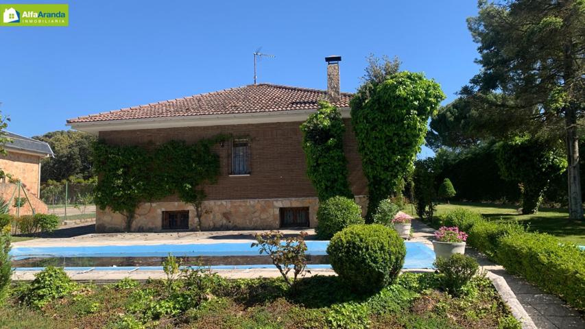 PARCELA EN VENTA CON CHALET EN URBANIZACIÓN LA CALABAZA photo 0