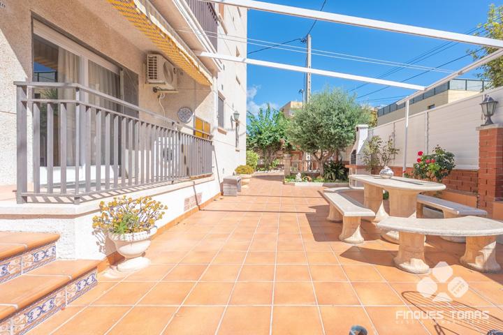 Planta baja con gran terraza privada en Cunit photo 0