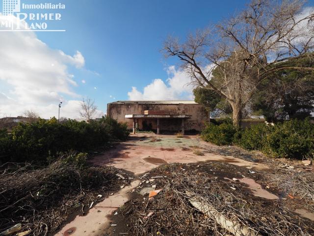 Se vende terreno rustico con contruccion en la zona de Juan Carlos I photo 0