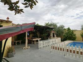 Casa con piscina y parcela en Fuente Palmera photo 0