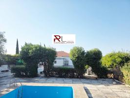 PARCELA CON UNA VIVIENDA, 2 APARTAMENTOS Y PISCINA photo 0