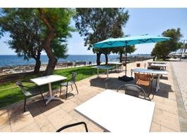En exclusiva local restaurante en primera linea Cala bona photo 0