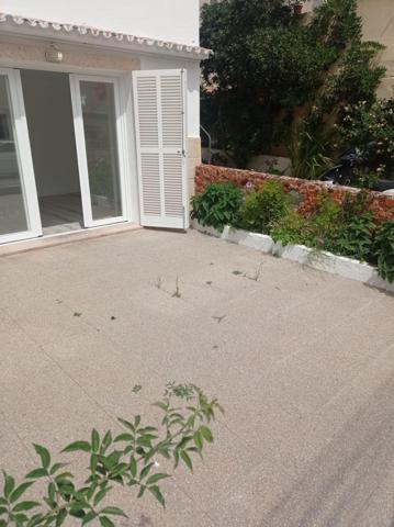 Encantadora planta baja luminosa en Portocolom con terraza photo 0