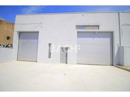 Espacio industrial diáfano con acceso dual y gran potencial en Vic photo 0