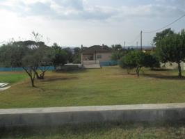 Bonita casa con loft en la planta baja con gran parcela llana photo 0