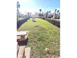 Planta baja con jardín en primera línea photo 0