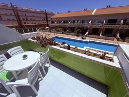 ¡Oportunidad única en El Médano – Piso reformado con buhardilla y vistas a la piscina! photo 0