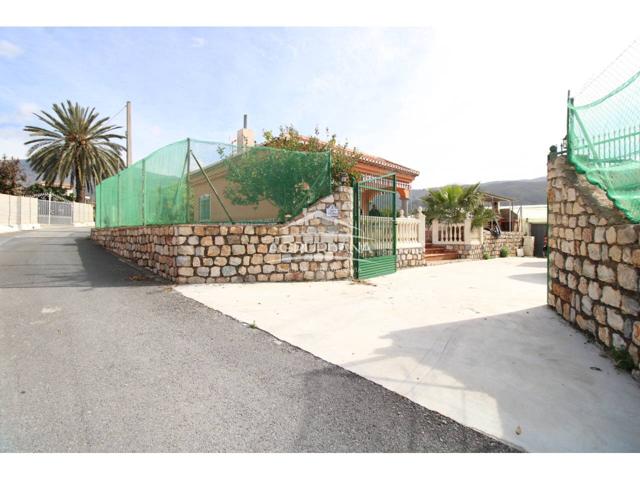 Finca con cortijo e invernadero en venta. photo 0