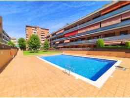 Piso con piscina comunitaria photo 0