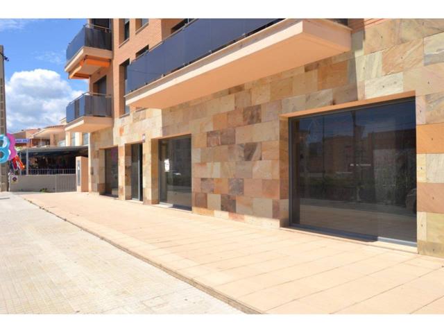 Local comercial en venta en Miami Platja photo 0