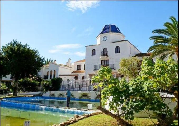 Se vende adosado en Port Marí Playa Carabasí photo 0