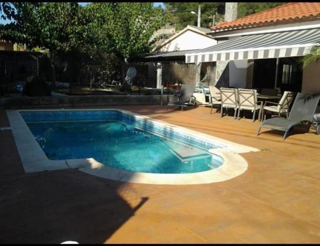 Casa con piscina en Camí de la Creu de Vacarisses photo 0