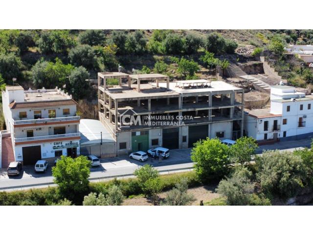 Edificio sobre almacén en Alcolea photo 0