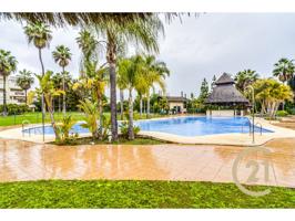 Encantador y exclusivo apartamento en Estepona con piscina privada photo 0