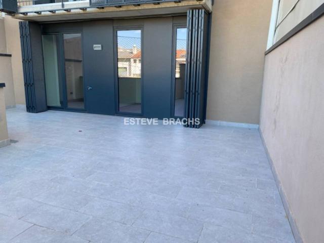 PISO CON GRAN TERRAZA 44m2 CON VISTAS, OBRA NUEVA PLAÇA PERPINYA GRANOLLERS (CENTRO) photo 0