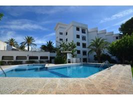 Apartamento cerca del Puerto Deportivo con jardín y piscina comunitaria photo 0