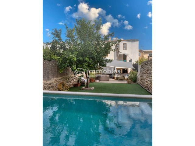 CASA ADOSADA EN EL CENTRO DE ALARÓ. photo 0