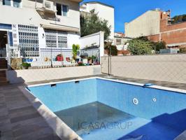 Casa adosada con piscina en Can Rosas Rubí photo 0