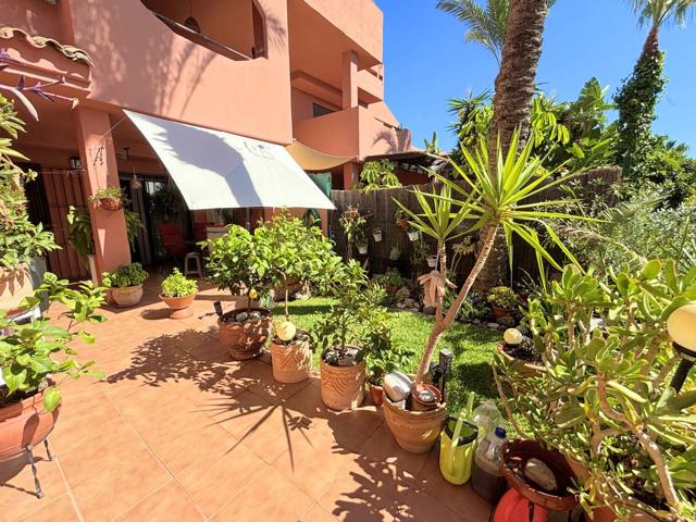 PRECIOSO BAJO CON JARDÍN PRIVADO EN URBANIZACION CERRADA EN CASARES COSTA. photo 0