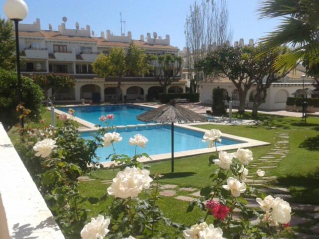 Apartamento dúplex en primera planta con vistas a la piscina comunitaria photo 0