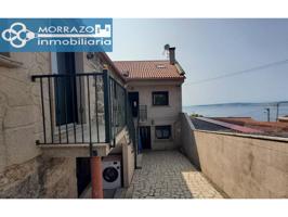 Parcela con tres viviendas con vistas photo 0