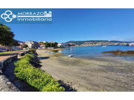 Piso para reformar en Moaña en primera línea de playa photo 0