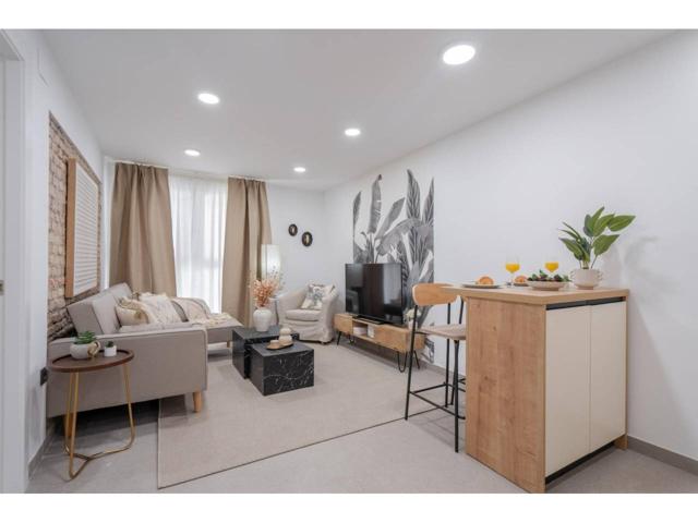Este encantador piso, situado junto al Palacio de Congresos, es la opción ideal para quienes buscan comodidad y estilo e photo 0