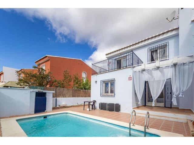 Descubra esta maravillosa casa adosada, una joya en el tranquilo y bien comunicado municipio de Jun, a un paso de la cap photo 0