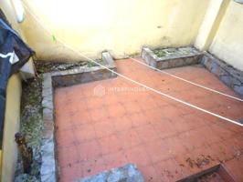 Bajos con patio photo 0