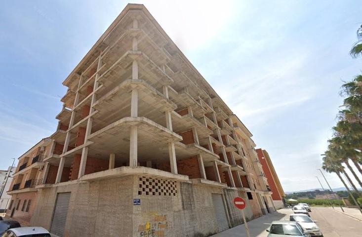 Edificio plurifamiliar entre medianerías del año 2008 en el municipio de Carlet catalogado cono zona photo 0