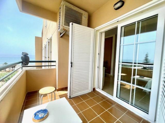 ALQUILER LARGA TEMPORADA- APARTAMENTO 1 DORMITORIO 1ª LINEA DE PLAYA CON VISTAS AL MAR , PISCINA Y GARAJE photo 0