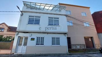 Casa con terreno en centro de Pobra do Caramiñal photo 0