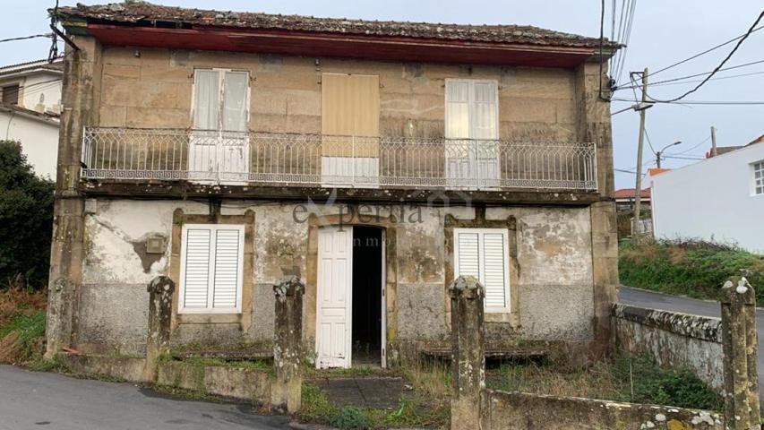 Casa de piedra con terreno en Muros photo 0