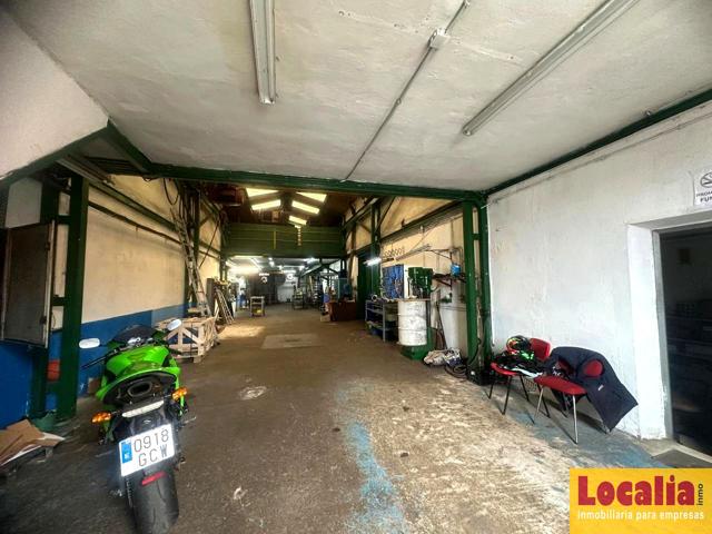 Nave industrial en Santander con oficinas y puente grúa photo 0