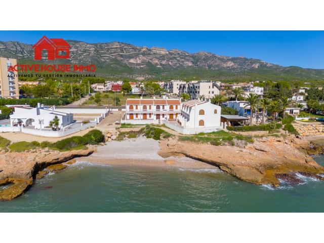 Venta de chalet adosado en primera línea de playa en Alcanar-playa photo 0