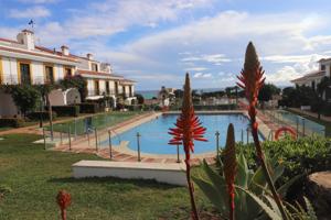 CHALET ADOSADO CON JARDÍN, PISCINA, VISTAS AL MAR Y LICENCIA TURÍSTICA photo 0