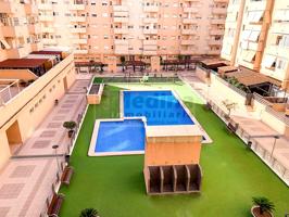 Estupendo piso en urbanización con piscina y plaza de garaje photo 0