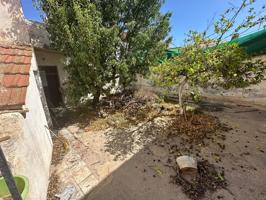 CASA CON PATIO PARA REFORMAR JUNTO AL CENTRO DE PUERTO LUMBRERAS photo 0