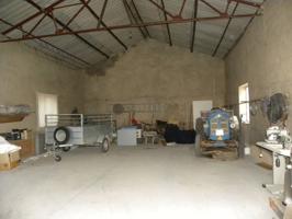 Nave comercial en venta en Singla photo 0
