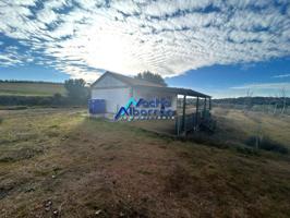 VENTA DE PARCELA DE 25.000 M2 CON CASA DE 83 M2 EN TALAVERA LA REAL photo 0