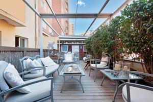 Preciosa planta baja perfecto estado con pk con terraza de 50 m2 photo 0