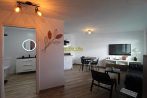 BAJO EN ALQUILER DOS HABITACIONES Y UN BAÑO EN EL CENTRO DE CANGAS, PERFECTO ESTADO photo 0