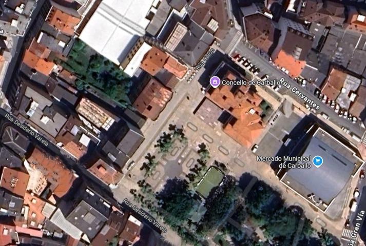 Solar y edificio frente al Jardín Municipal de Carballo photo 0
