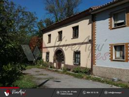 Caserío de 55.237 m2 con una casa adosada. Parcela completamente llana. photo 0