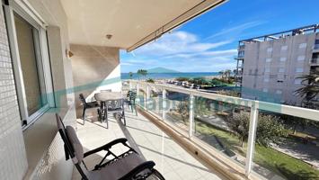 Bonito apartamento en primera línea de Playa de Daimús. Con piscina, garaje y trastero!!!! photo 0