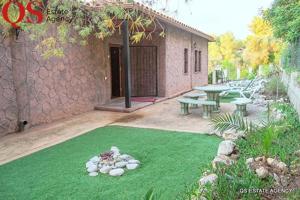 Casa rústica con jardín en Costa Cunit photo 0