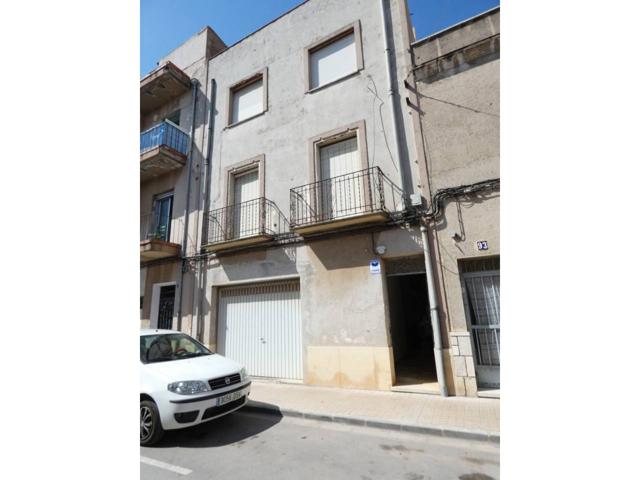 Casa en venta con almacén y dos viviendas. photo 0