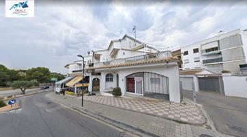 Venta local comercial y plaza de garaje en L'escala photo 0