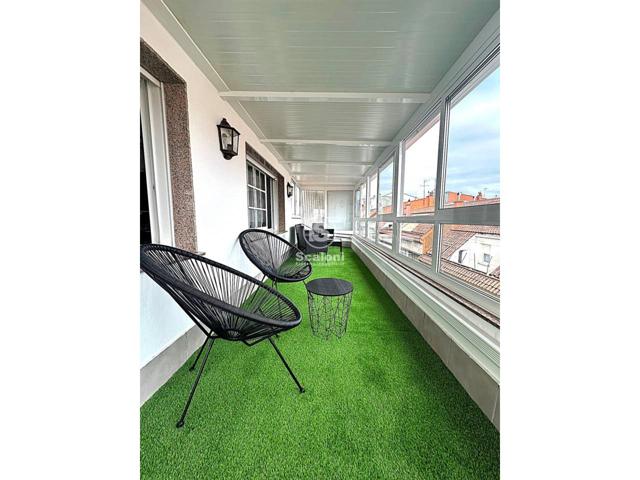 Edificio con cuatro viviendas, un bajo comercial, garajes y trasteros en Cambados photo 0