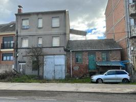 SE VENDE EDIFICIO DE 2 PISOS , BAJO Y FINCA photo 0